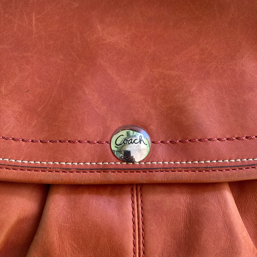 Coach SoHo, Burnt Orange Leather Shoulder Bag EUC, picture 8 shows a tiny dot - Picture 3 of 13